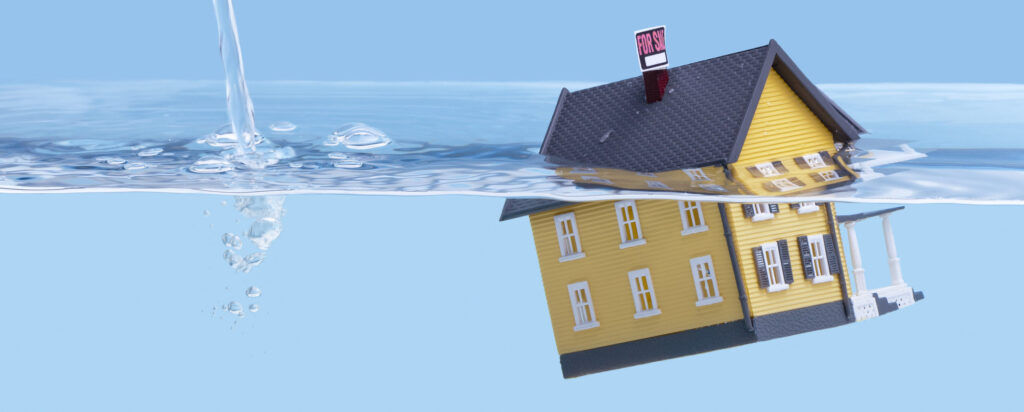 a toy house floating in water