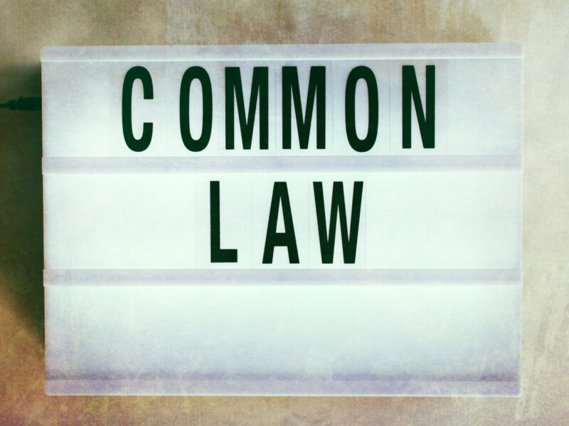 The wording 'Common Law' in an historically aged lightbox theme for a modern look at law. Common law is in simplistic terns judge-made law judge-made law which may be amended and developed by the courts. Smith Debnam Attorneys at Law, What is Common Law Marriage?